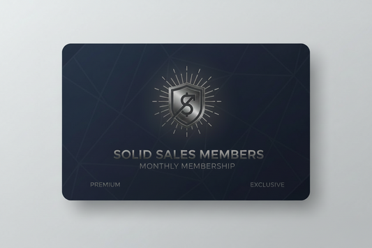 A dark navy blue membership card with a metallic silver shield logo and the text 'SOLID SALES MEMBERS MONTHLY MEMBERSHIP' on a light gray background.